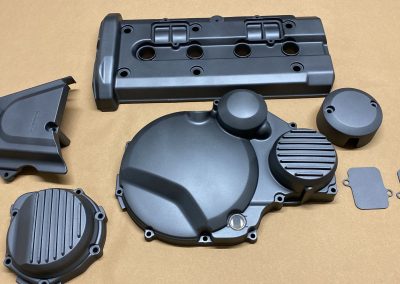 Motorcycle engine cover finished in grey ceramic coating