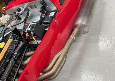 Motorcycle exhaust finished in Cerakote to reduce heat on the side panel